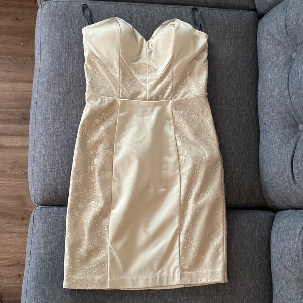 Bebe cocktail dress. Size small. Shiny beige color.